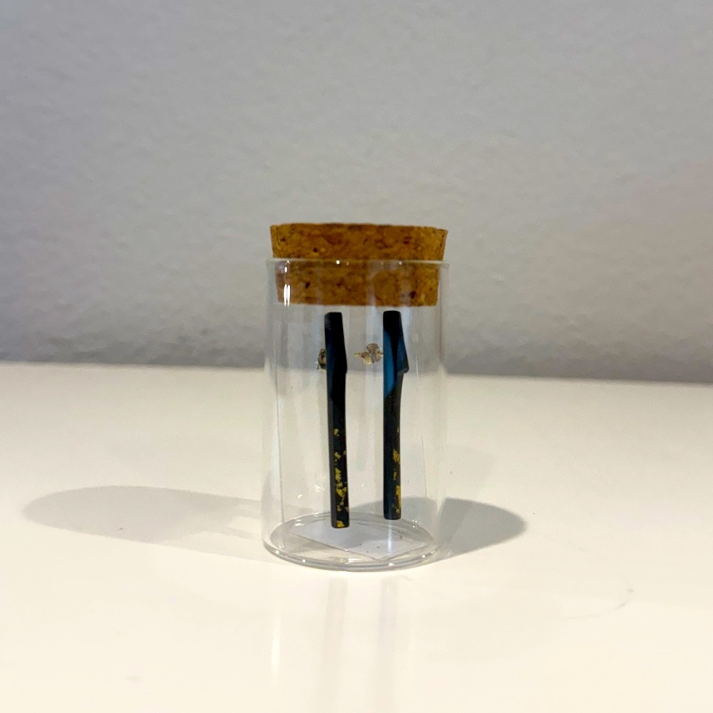 Delicate black and gold mini chopstick earrings